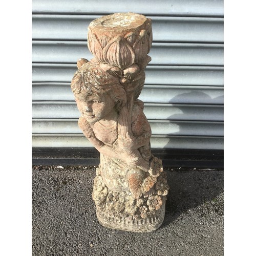 349 - A concrete garden statue 66cm high