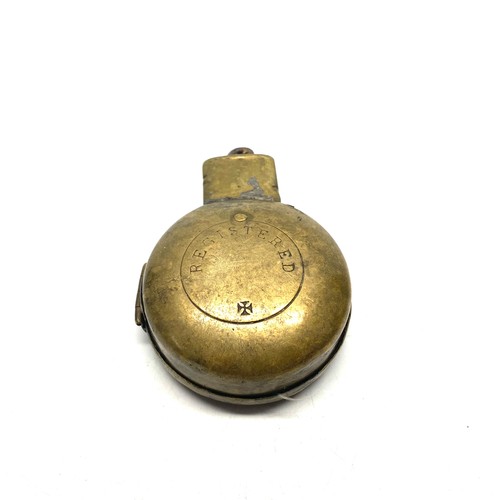 628 - Brass miners pocket watch case with “registered” to the rear and a Maltese type cross