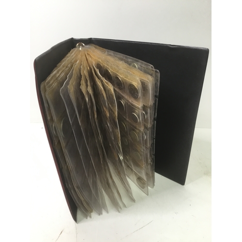855 - A folder of world coins including UK, Belgium, Italy and others see all pictures