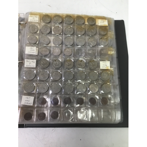 855 - A folder of world coins including UK, Belgium, Italy and others see all pictures