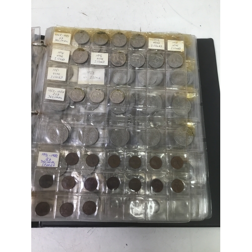 855 - A folder of world coins including UK, Belgium, Italy and others see all pictures