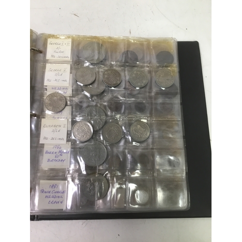 855 - A folder of world coins including UK, Belgium, Italy and others see all pictures