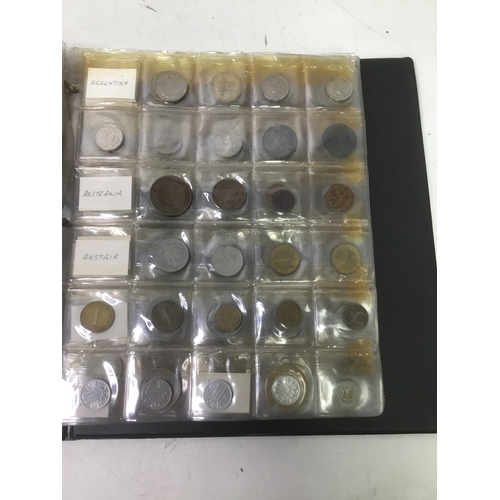 855 - A folder of world coins including UK, Belgium, Italy and others see all pictures