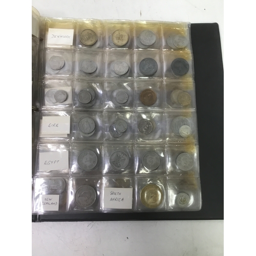 855 - A folder of world coins including UK, Belgium, Italy and others see all pictures