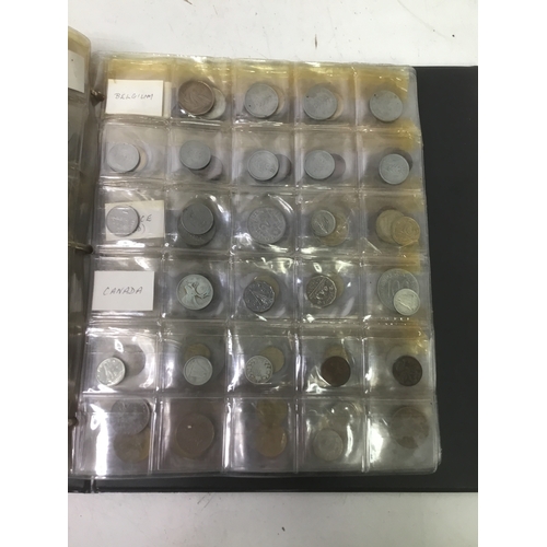 855 - A folder of world coins including UK, Belgium, Italy and others see all pictures