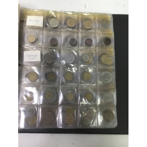855 - A folder of world coins including UK, Belgium, Italy and others see all pictures