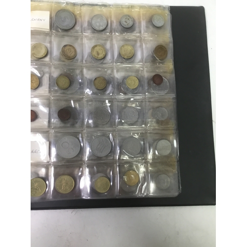 855 - A folder of world coins including UK, Belgium, Italy and others see all pictures