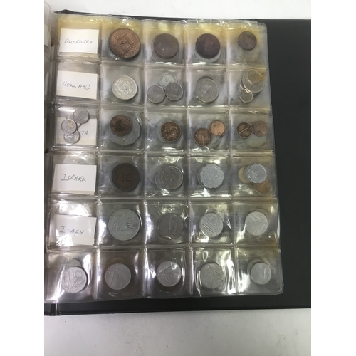 855 - A folder of world coins including UK, Belgium, Italy and others see all pictures