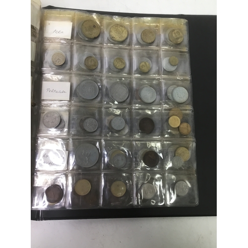 855 - A folder of world coins including UK, Belgium, Italy and others see all pictures
