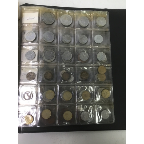 855 - A folder of world coins including UK, Belgium, Italy and others see all pictures
