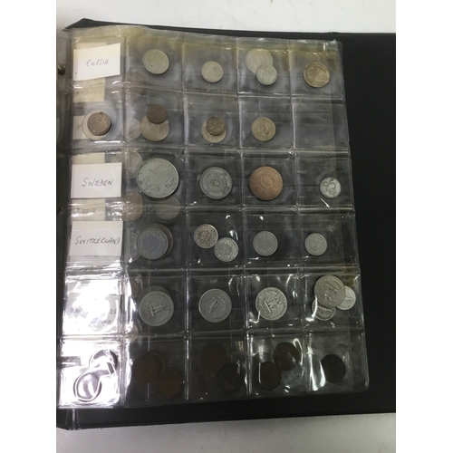 855 - A folder of world coins including UK, Belgium, Italy and others see all pictures