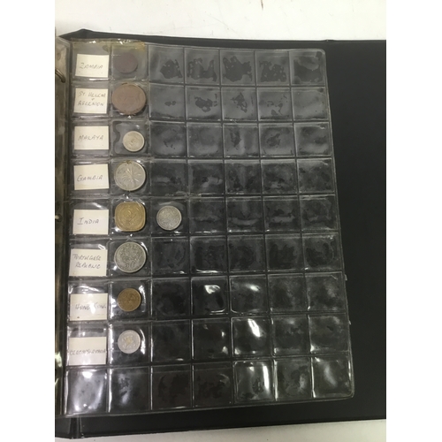855 - A folder of world coins including UK, Belgium, Italy and others see all pictures