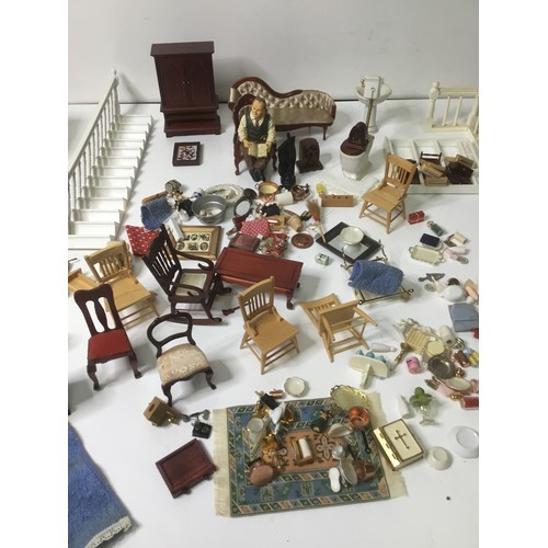 663 - A large amount of vintage dolls house furniture