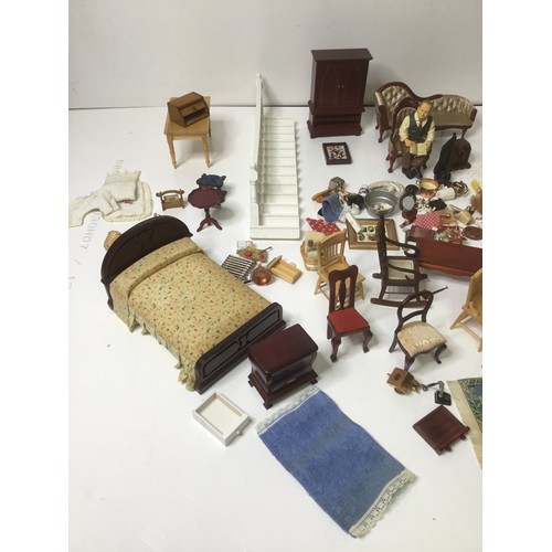 663 - A large amount of vintage dolls house furniture