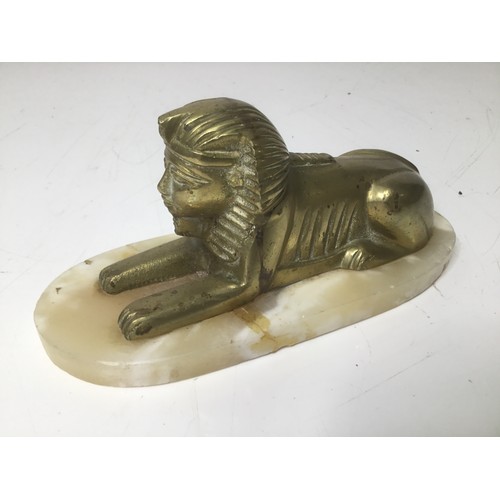 708 - Vintage brass Sphinx on a marble base