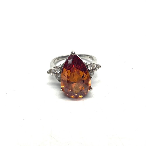 762 - Silver fire opal ring size with Cz shoulders size O