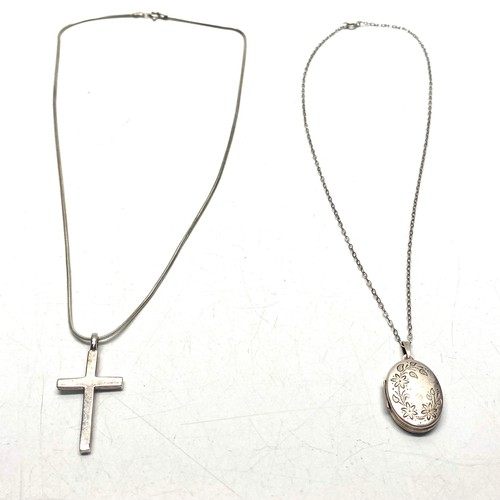 886 - Silver cross and chain and a silver locket and chain