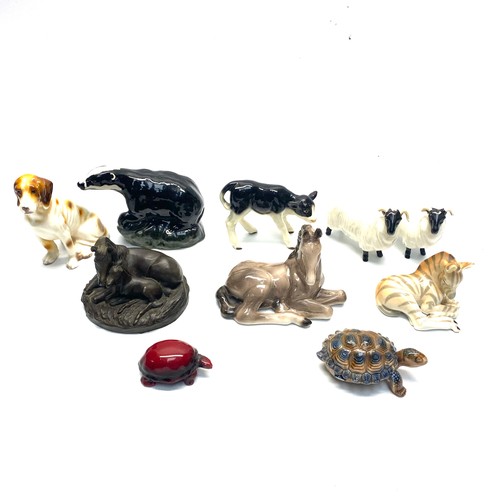 470 - collectable ceramic animals including wade, welsh badger, and royal doulton.