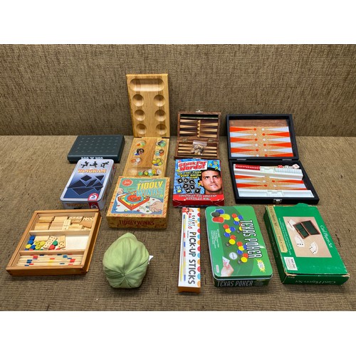 478 - selection of mini board games including tiddlywinks, pick up sticks.