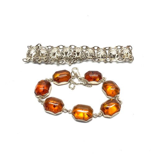 895 - Silver bracelet and a amber and silver bracelet.