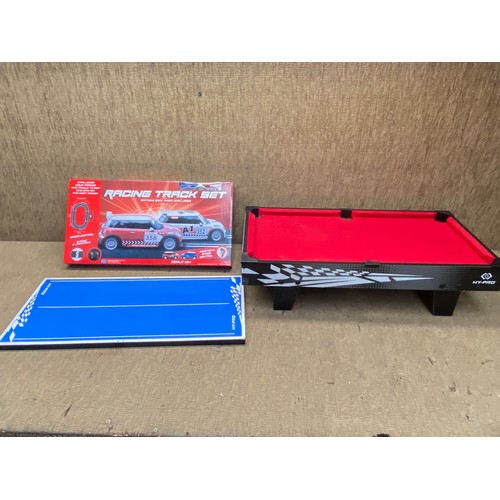 482 - WK international electric racing track set and mini pool table/table tennis set (no cues or paddles)... 