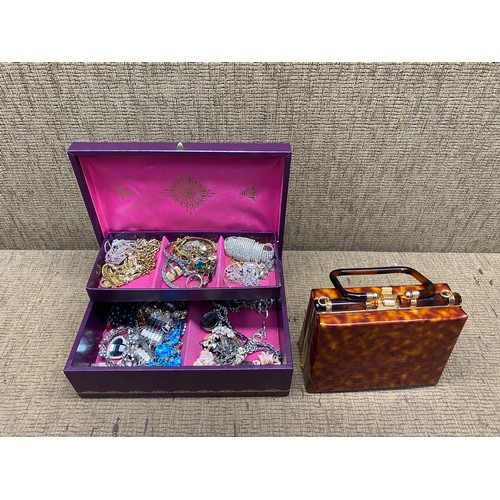 489 - Jewellery box with contents and a vintage clutch bag