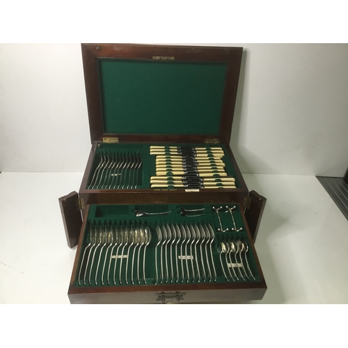 1102 - Large wooden cased cutlery set by Cross Bros Cardiff with original key and working lock