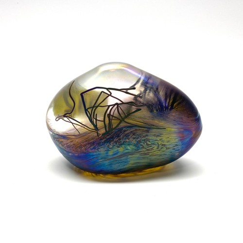 982 - Iridescent hand blown art glass paper weight in the shape of a stone by Lazlo.