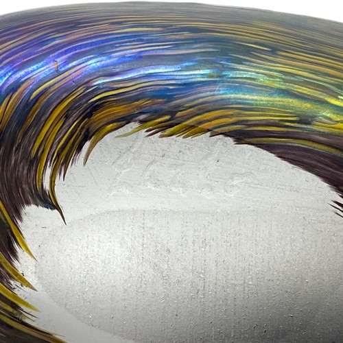 982 - Iridescent hand blown art glass paper weight in the shape of a stone by Lazlo.