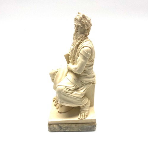 601 - Reproduction Alabaster sculpture of Moses by Michelangelo on a marble base; 24cm tall.