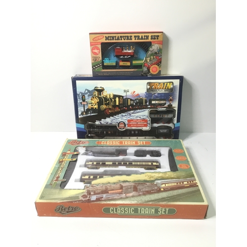 69 - Three train sets by Retro toys, TJM Ltd and PMS