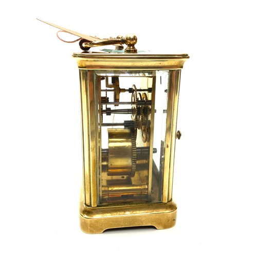 636 - Lovely heavy brass skeleton clock (working with key).