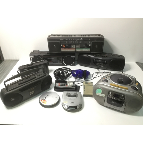 122 - Mixed electrical items including Sony stereo tape recorders, headphones and a Sony CD Walkman