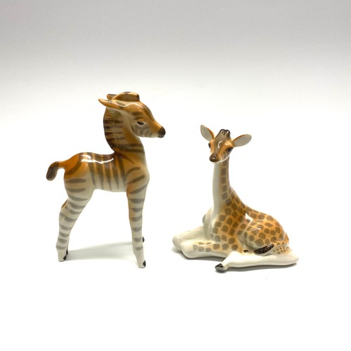 668 - Collectible ceramic Zebra and Giraffe made in Russia.