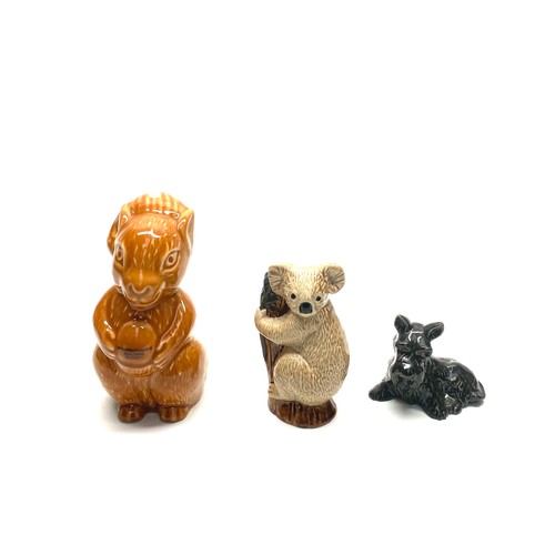 672 - Wade Collectors Figures including: Squirrel money bank, Scotty dog and a Koala Bear.