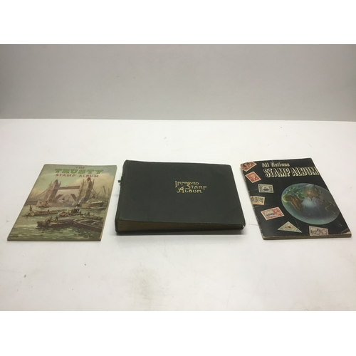 660 - Three stamp albums with various stamps from around the world