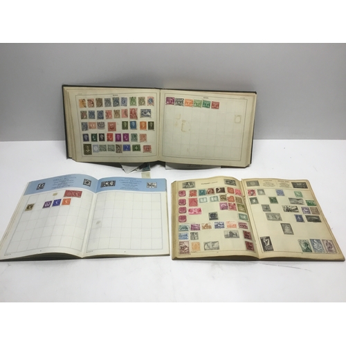 660 - Three stamp albums with various stamps from around the world