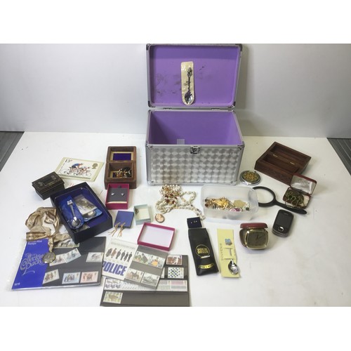 251 - Box containing rummaging items, including costume jewelry and stamps.