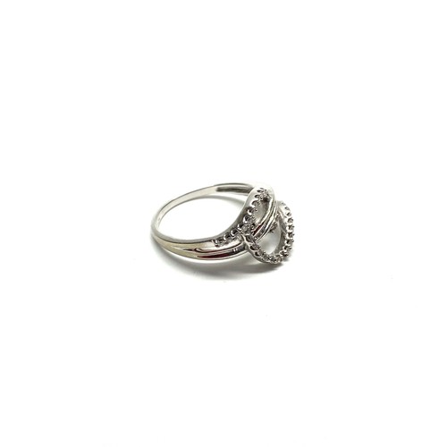 898 - 9ct white gold ring with diamonds (one missing) 3.5g and size O.