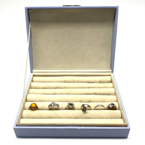 705 - Six silver rings in a ring box.