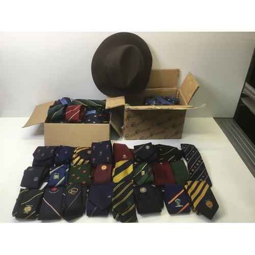 259 - A large quantity of vintage ties all sports related including a hat from the Hat company Susquehana