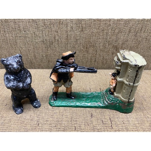 733 - william tell shooting an apple mechanical cast iron coin bank and a cast iron bear.
