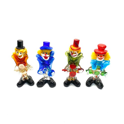 735 - 4 vintage Murano glass clowns.