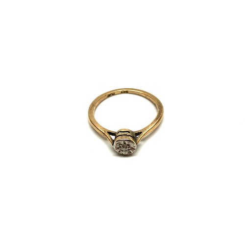 906 - 9ct gold diamond ring with platinum mount. 1.4g and size K.