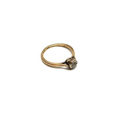906 - 9ct gold diamond ring with platinum mount. 1.4g and size K.