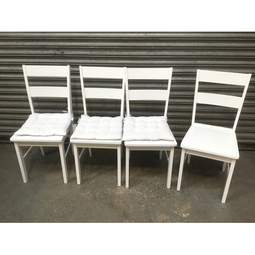 290 - Four white modern kitchen chairs