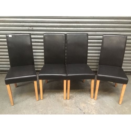 303 - Four leather style dining chairs