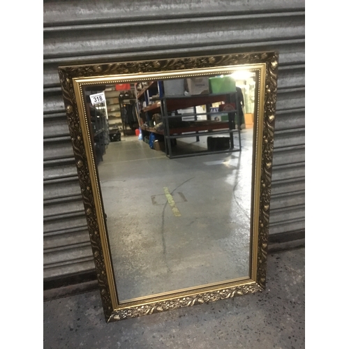 318 - Large gold framed mirror 86cm x 60cm