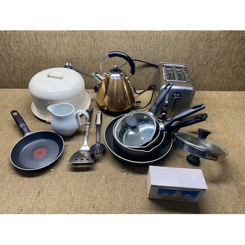 306 - mixed kitchen items including kettle, sauce pans, toaster.