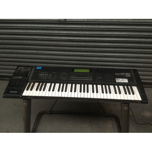 1100 - Roland XP-60 music workstation keyboard (stand not included)